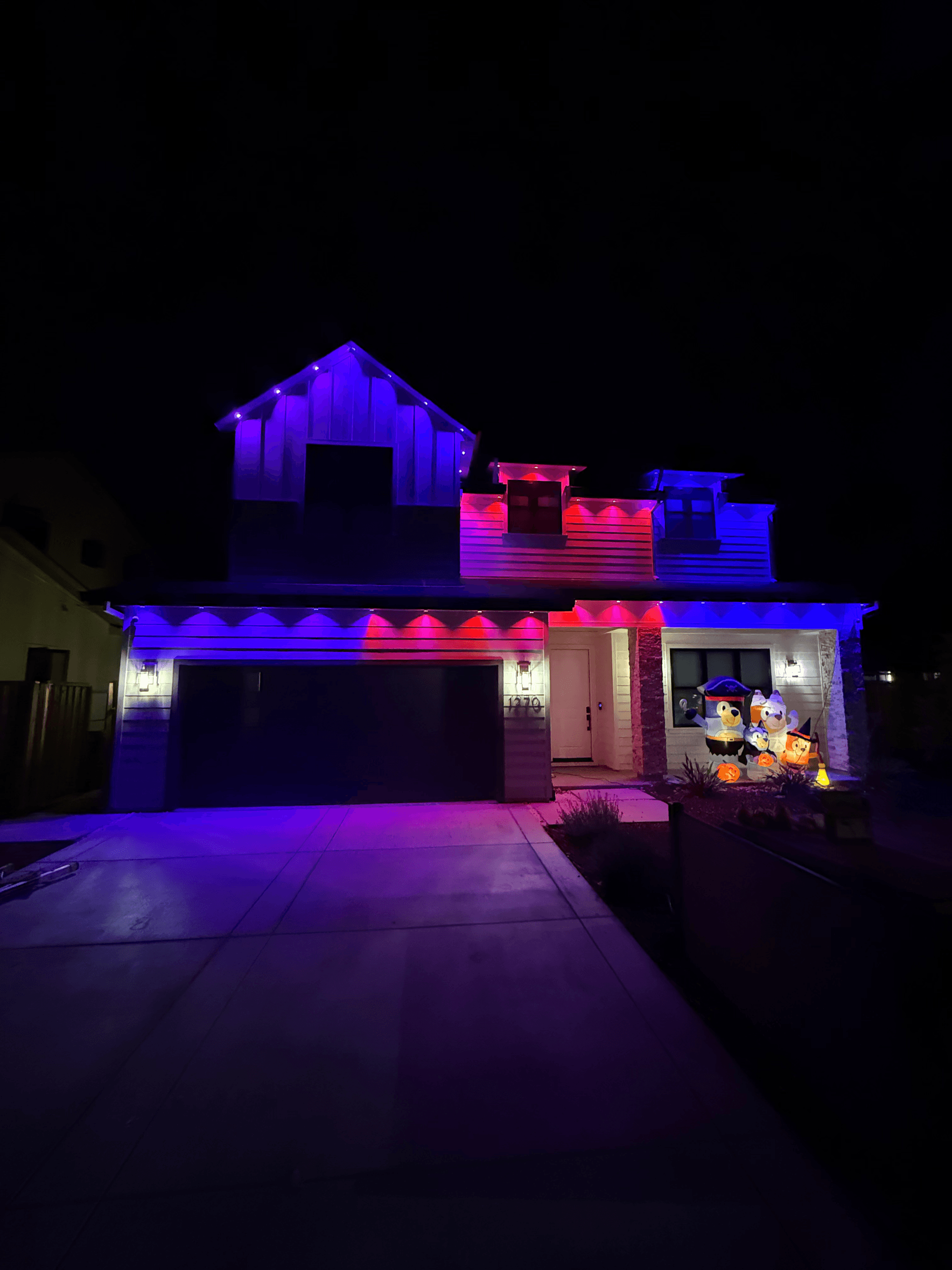 Modern farmhouse with blue and purple smart lighting