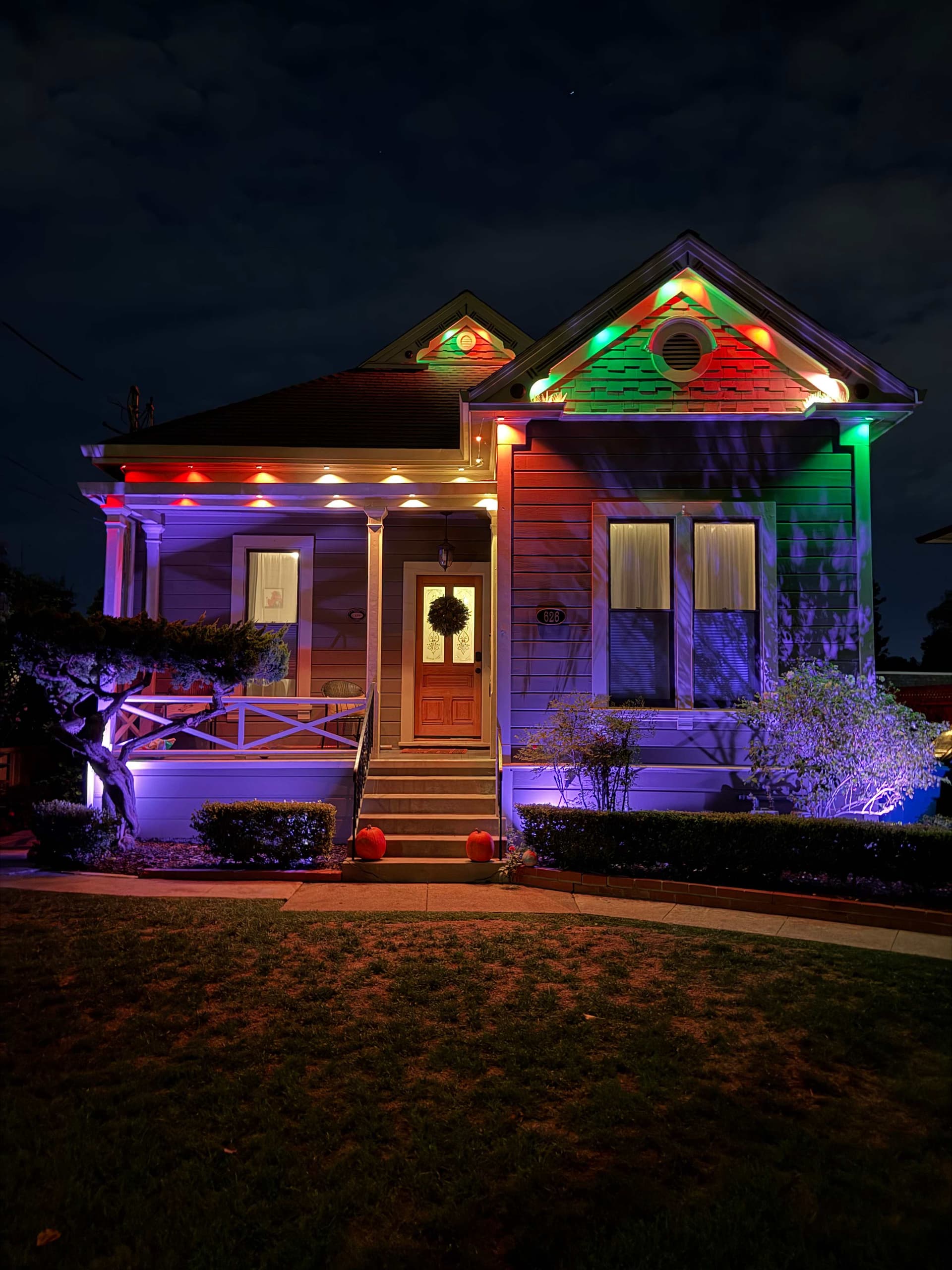 Victorian home with multi-color smart roofline