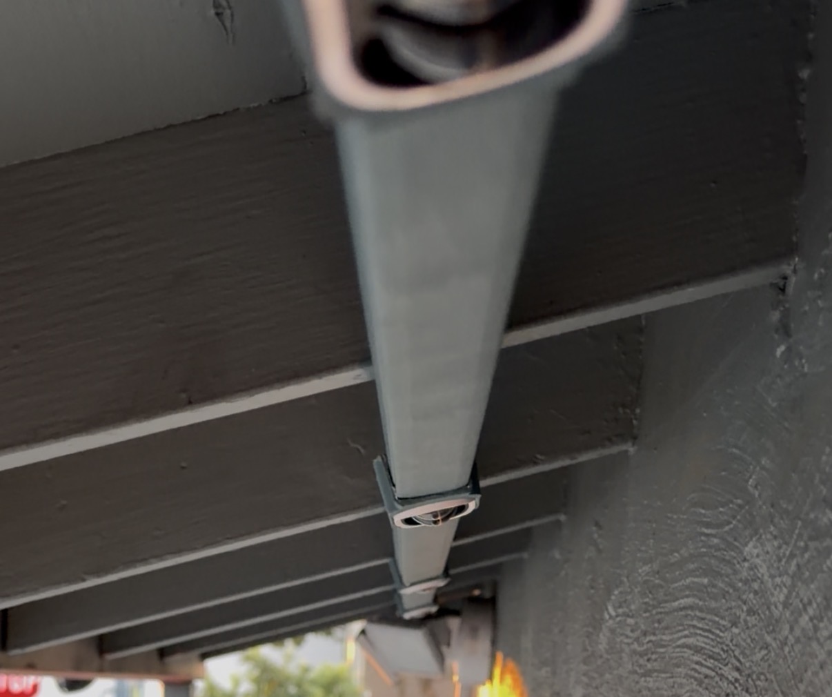 Close-up detail of color-matched PermTrack installation system